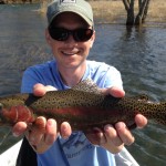 Clint caught a beautiful South Holston river rainbow while fishing with Huck