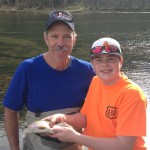 Fly fishing lesson on the South Holston river grandfather and grandson