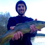 Jordan with a 20.5 inch Watauga River brown trout while fishing with Huck