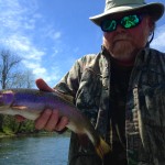 Kelsey with a Watauga river rainbow